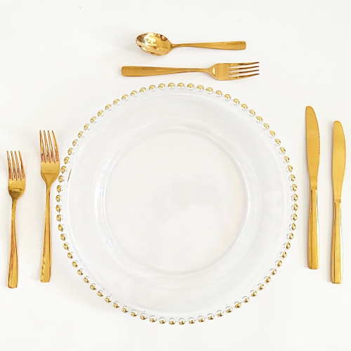 gold cutlery with gold charger plate gold beads