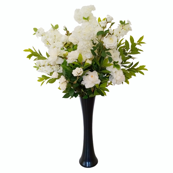 green leaves with white peoniens and white roses and white cherry blossoms on a black vase